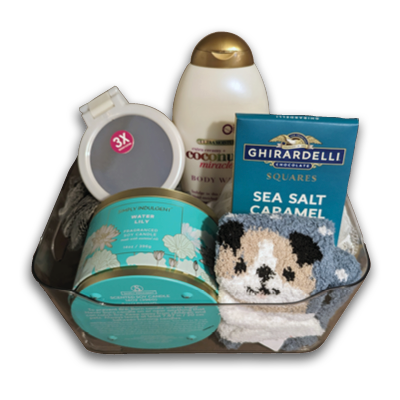 pamper gift set with bath and body items, fuzzy socks, sea salt caramel chocolates